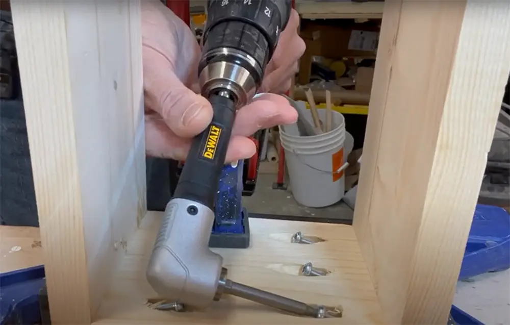 What is the best way to drill a hole in a tight space?
