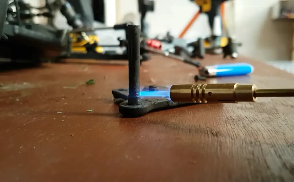 Removing Thread locked Screws With A Soldering Iron