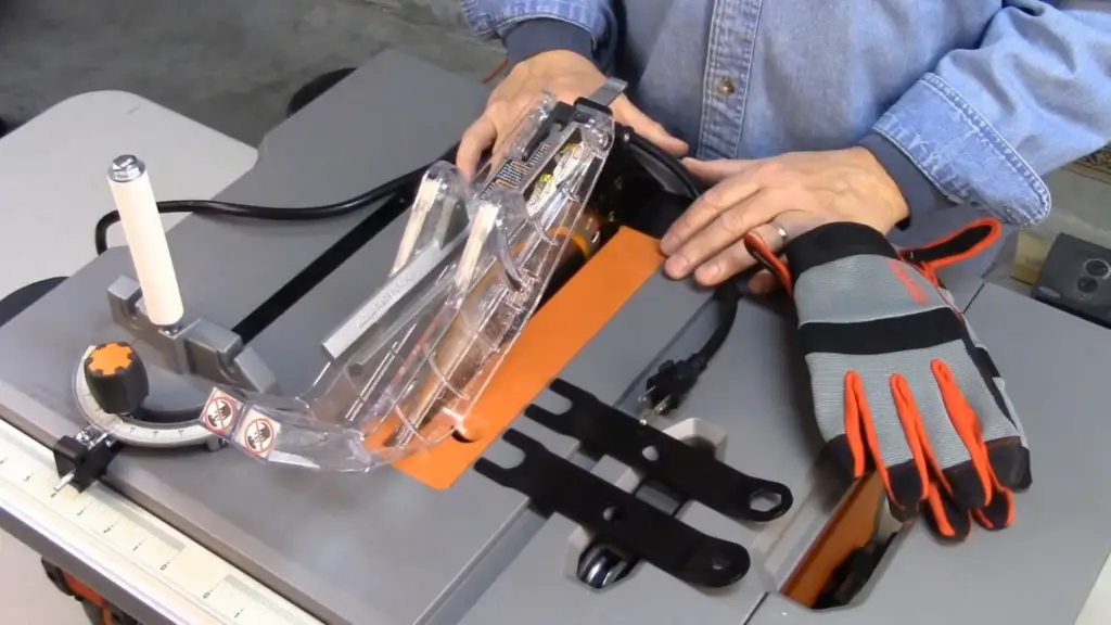 How do you remove a stuck miter saw blade?