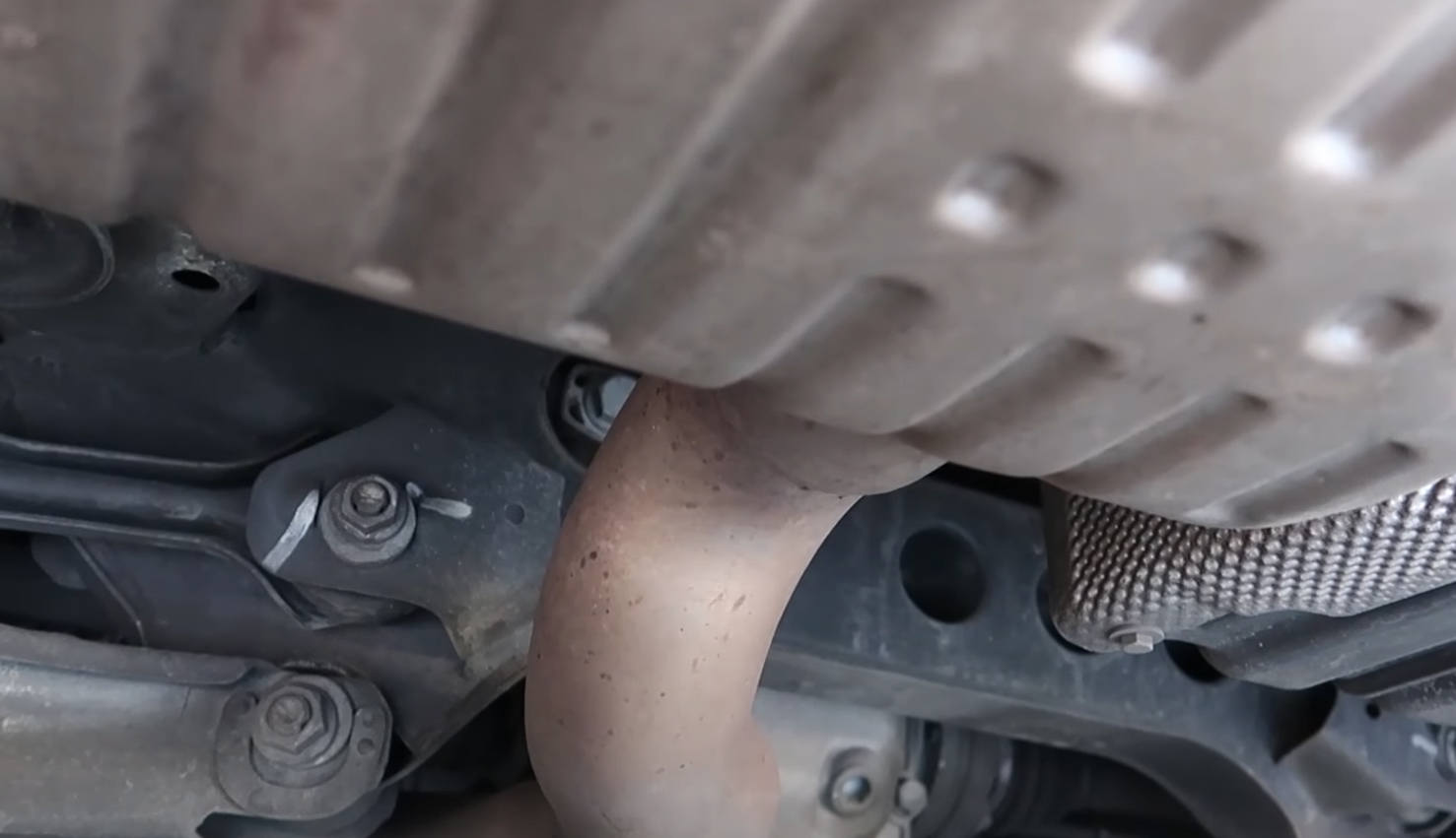 Where to Drill Holes in Muffler? ToolsProfy