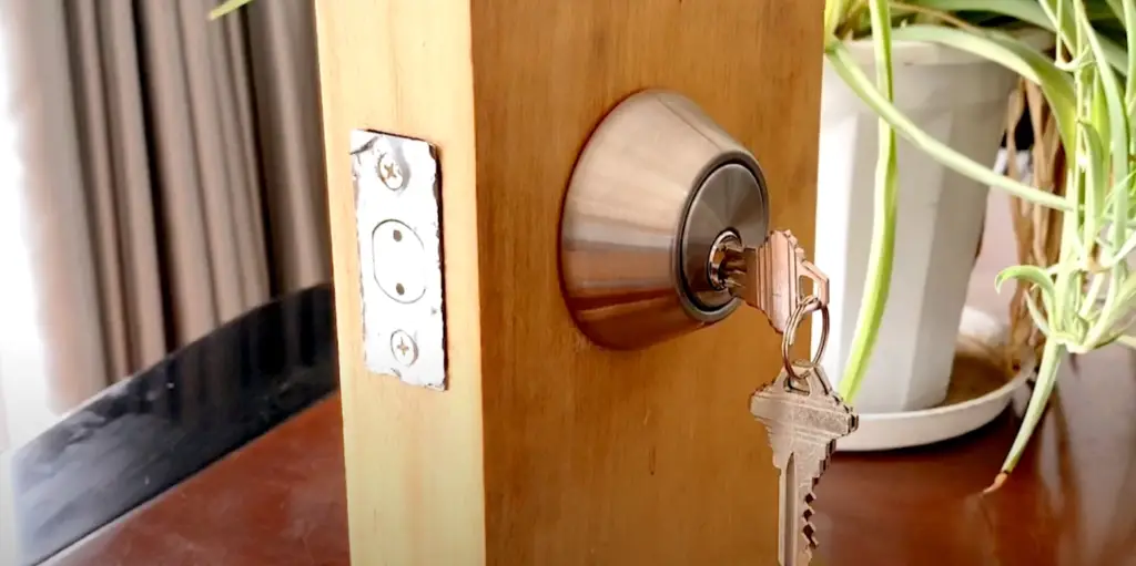 How Do You Turn the Screwdriver Once It is Inserted Into the Keyhole of the Deadbolt Lock?