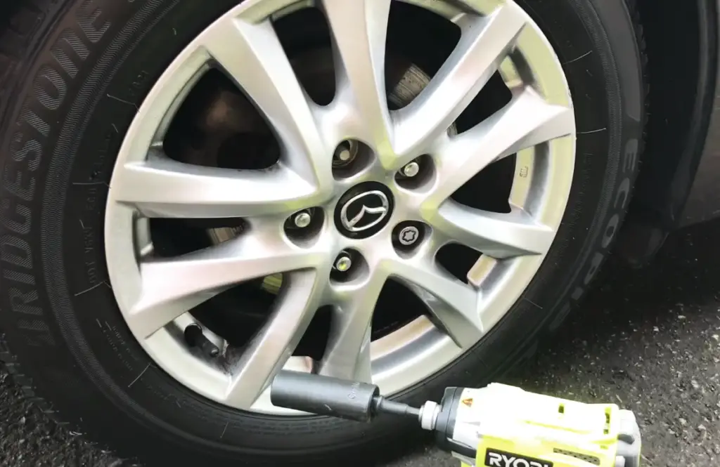 Is it possible to utilize a hammer drill for the purpose of removing lug nuts?